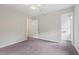 Spacious bedroom with neutral carpeting, and access to a bathroom at 3405 Bonaparte Way, Durham, NC 27707