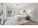 Cozy bedroom features a soft rug, natural light, and minimalist decor at 3405 Bonaparte Way, Durham, NC 27707