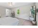 Bright bedroom with a ceiling fan, natural light, and a comfortable bed at 3405 Bonaparte Way, Durham, NC 27707