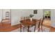 Cozy dining area with a stylish table and view into kitchen, perfect for Gathering meals at 3405 Bonaparte Way, Durham, NC 27707