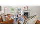 Inviting living room with fireplace, hardwood floors, and comfortable seating arrangement at 3405 Bonaparte Way, Durham, NC 27707
