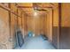 Interior of a shed with exposed wooden beams, a concrete floor, and adequate storage at 3405 Bonaparte Way, Durham, NC 27707