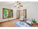 Relaxing sunroom with a ceiling fan, skylight, hardwood floors and a calming atmosphere at 3405 Bonaparte Way, Durham, NC 27707