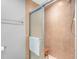 Tiled shower featuring a glass door, bench, and modern fixtures at 342 Faith Dr, Gibsonville, NC 27249