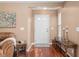 Welcoming entryway with hardwood floors, neutral walls, and classic decor at 342 Faith Dr, Gibsonville, NC 27249