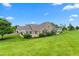 Attractive home showcasing a blend of stone and siding, with a meticulously maintained lawn at 342 Faith Dr, Gibsonville, NC 27249