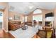 Spacious living room featuring hardwood floors, fireplace, and ample natural light at 342 Faith Dr, Gibsonville, NC 27249