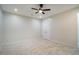 Neutral bedroom offers recessed lights and a closet with double doors at 361 Anterbury Dr # B, Apex, NC 27502