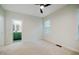 Bright bedroom with modern ceiling fan and an en-suite bathroom at 361 Anterbury Dr # B, Apex, NC 27502