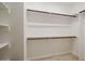 Walk-in closet with shelving and clothing rods offers ample storage at 361 Anterbury Dr # B, Apex, NC 27502
