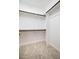 Bright closet with carpet, white walls, wood shelf support, and base trim at 361 Anterbury Dr # B, Apex, NC 27502