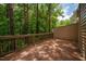 Spacious wooden deck with wooded scenery, creating a relaxing outdoor space at 361 Anterbury Dr # B, Apex, NC 27502
