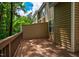 Spacious wooden deck with wooded scenery, providing a peaceful outdoor space at 361 Anterbury Dr # B, Apex, NC 27502