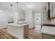 Bright kitchen with island, stainless steel appliances, and plenty of counter space at 361 Anterbury Dr # B, Apex, NC 27502