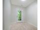 Light-filled room with access to the outdoors through a glass door at 361 Anterbury Dr # B, Apex, NC 27502