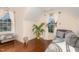 Cozy bedroom with hardwood floors, natural light, and stylish furniture at 3904 Freemark Ln, Fuquay Varina, NC 27526