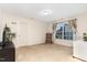 Cozy bedroom with a chair by the window, neutral carpet, and ample natural light at 3904 Freemark Ln, Fuquay Varina, NC 27526