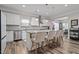 Modern kitchen with large island and breakfast bar seating at 3909 Mendenhall Dr, Zebulon, NC 27597