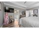 Bedroom with access to bathroom featuring dual sinks and bathtub at 3909 Mendenhall Dr, Zebulon, NC 27597