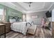 Spacious bedroom with tray ceiling and calming color palette at 3909 Mendenhall Dr, Zebulon, NC 27597