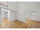 Spacious living room boasts hardwood floors, neutral paint, and an open layout at 3940 Lake Ferry Dr, Raleigh, NC 27606