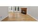 An inviting living room showcasing hardwood floors and a cozy fireplace, creating a warm atmosphere at 3940 Lake Ferry Dr, Raleigh, NC 27606