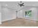 Bright living room featuring luxury vinyl plank flooring and lots of natural light at 401 N Raiford St, Selma, NC 27576