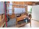 Basement with a work bench, shelves, and storage, providing a functional workspace at 404 Brightling Way, Holly Springs, NC 27540