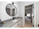 Bathroom featuring a gray vanity and a view into the bedroom at 404 Brightling Way, Holly Springs, NC 27540