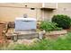 Exterior view of a home backup generator with a small garden box alongside it at 404 Brightling Way, Holly Springs, NC 27540