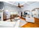 Cozy living room with hardwood floors, a coffered ceiling, and an open layout at 404 Brightling Way, Holly Springs, NC 27540
