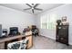 Bright office featuring a large window and space for multiple workspaces and custom storage at 404 Brightling Way, Holly Springs, NC 27540
