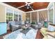 Charming screened patio boasts comfortable seating and views of the outdoors at 404 Brightling Way, Holly Springs, NC 27540