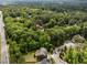 Stunning aerial view showcasing the property within lush, green surroundings at 420 Creekhurst Pl, Cary, NC 27519