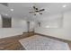 Spacious loft area with hardwood floors and recessed lighting at 420 Creekhurst Pl, Cary, NC 27519