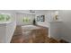 Bright upstairs loft with beautiful hardwood floors, a ceiling fan, and a large window at 420 Creekhurst Pl, Cary, NC 27519