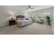Serene main bedroom with large windows and neutral decor at 420 Creekhurst Pl, Cary, NC 27519