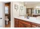 Bathroom with a modern wood vanity, marble countertops, and a shower at 4266 Aviemore Run, Burlington, NC 27215
