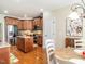Kitchen featuring stainless steel appliances, granite countertops, and hardwood floors at 4266 Aviemore Run, Burlington, NC 27215