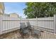 Comfortable backyard patio with paved floors and outdoor chairs for relaxing in the sun at 4621 Youngsbury Ct, Raleigh, NC 27604