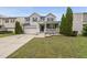 Charming two-story home featuring a covered porch, two-car garage and manicured lawn at 4621 Youngsbury Ct, Raleigh, NC 27604