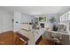 Cozy living room with fireplace, comfortable seating, and hardwood floors at 4621 Youngsbury Ct, Raleigh, NC 27604