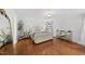 Spacious main bedroom with hardwood floors and ample natural light at 4621 Youngsbury Ct, Raleigh, NC 27604