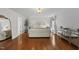 Spacious main bedroom with hardwood floors and ample natural light at 4621 Youngsbury Ct, Raleigh, NC 27604