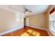 Bedroom showing gorgeous hardwood floors, a ceiling fan, and neutral colored walls at 504 Hillcrest Ave, Burlington, NC 27215
