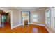 Cozy living room featuring hardwood floors, fireplace, and a bright, airy atmosphere at 504 Hillcrest Ave, Burlington, NC 27215