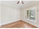 Cozy bedroom with hardwood flooring, natural light and a ceiling fan at 528 Bankhead Dr, Cary, NC 27519