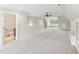 Light-filled bonus room offering built-in shelves, access to a bathroom, and large windows at 528 Bankhead Dr, Cary, NC 27519