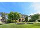 Beautiful home with manicured lawn, mature trees, and inviting front porch at 528 Bankhead Dr, Cary, NC 27519