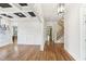 Spacious living room with coffered ceilings, hardwood floors, and detailed trim at 528 Bankhead Dr, Cary, NC 27519